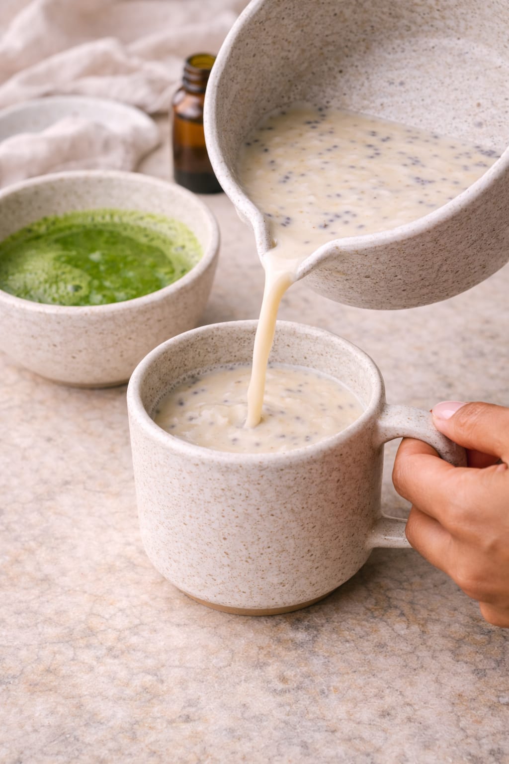Step 4: Pouring warm lavender vanilla milk into a mug