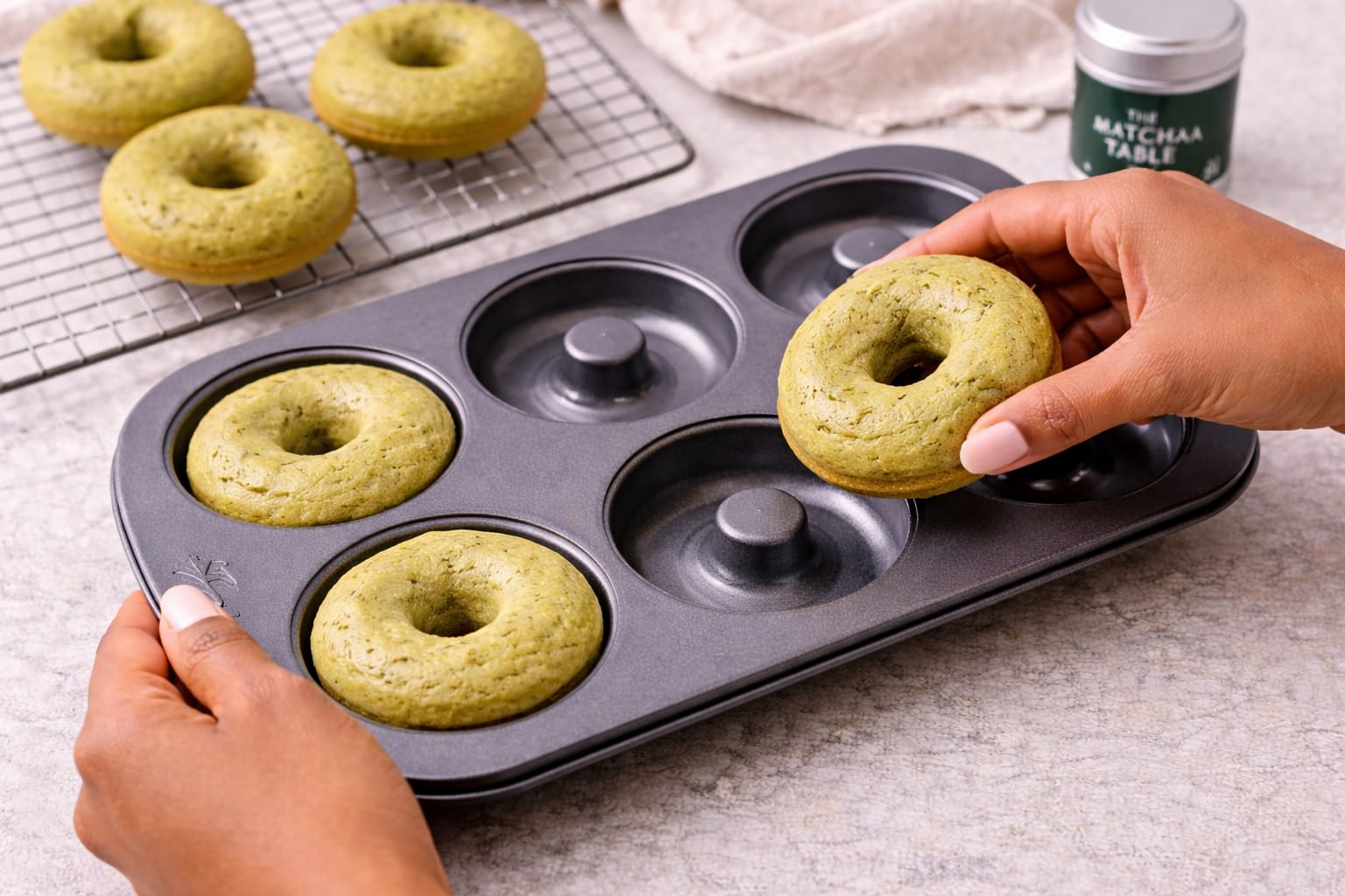 Step 6: Removing baked matcha donuts from the pan