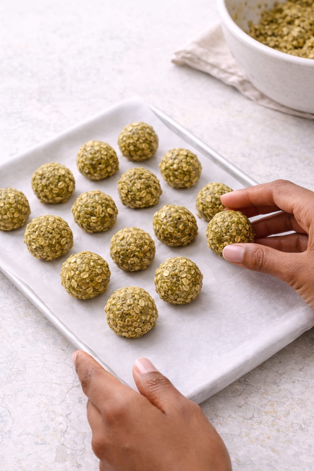 Chilling matcha energy bites on a tray