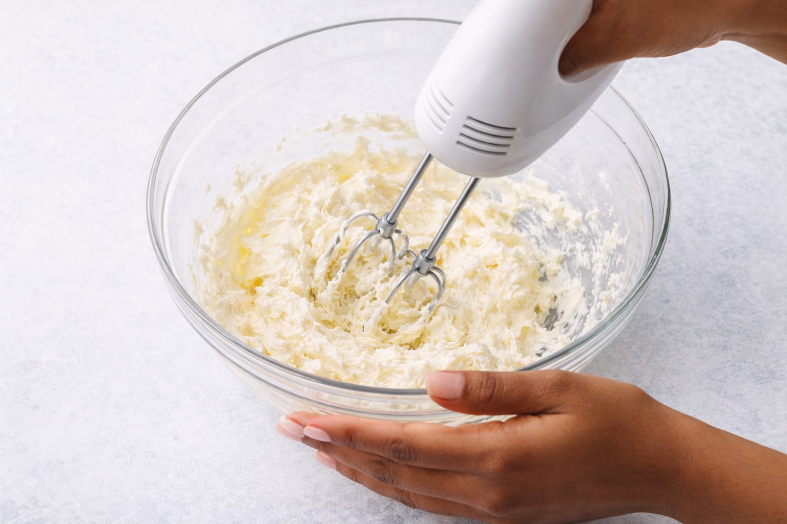 Step 1: Beating cream cheese and butter together for matcha cream cheese frosting